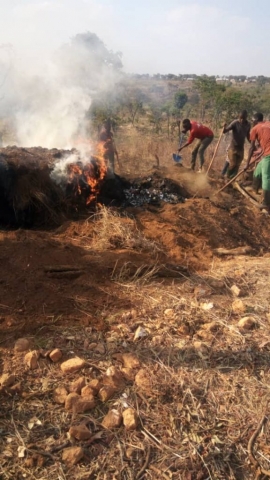 REDESO staff during patrol destroying charcoal kilns which accelarate to deforestation.