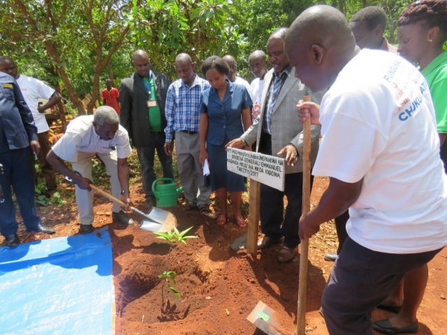 Kigoma Regional commissioner was standing near his memorial tree planted at MHA office in Nduta camp